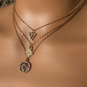 Gold Layered Necklace With Charms